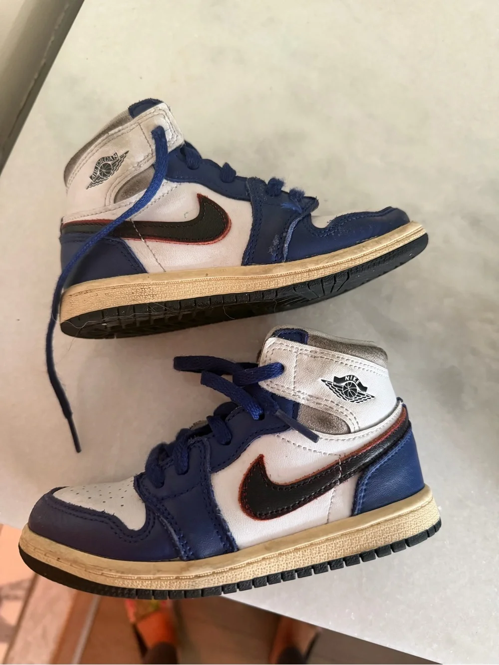 Nike Kids White and Blue High-Top Sneakers with Black Swoosh